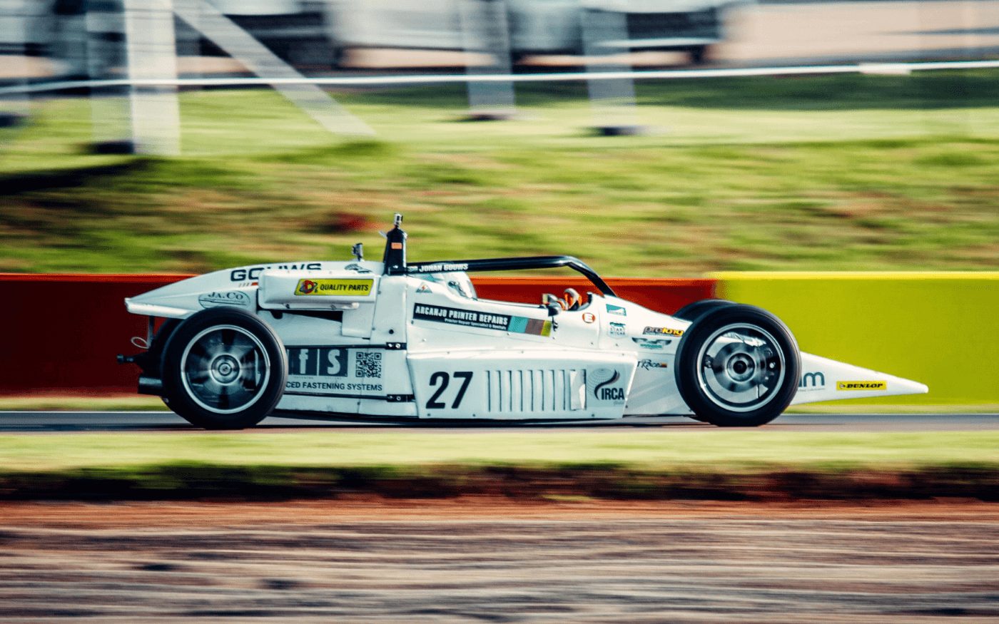 High speed panning shot of car #27